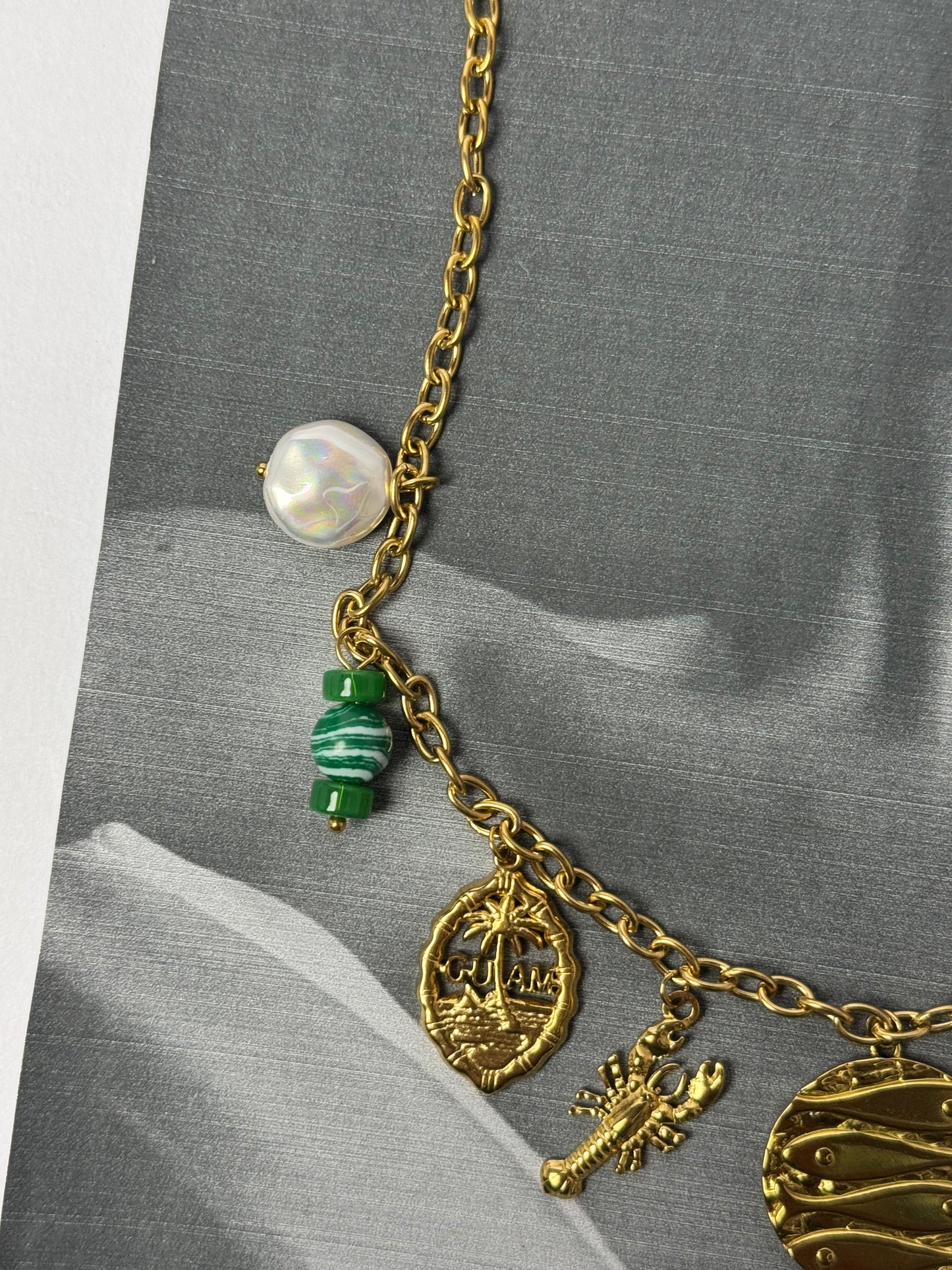 The waterproof ocean water charm necklace