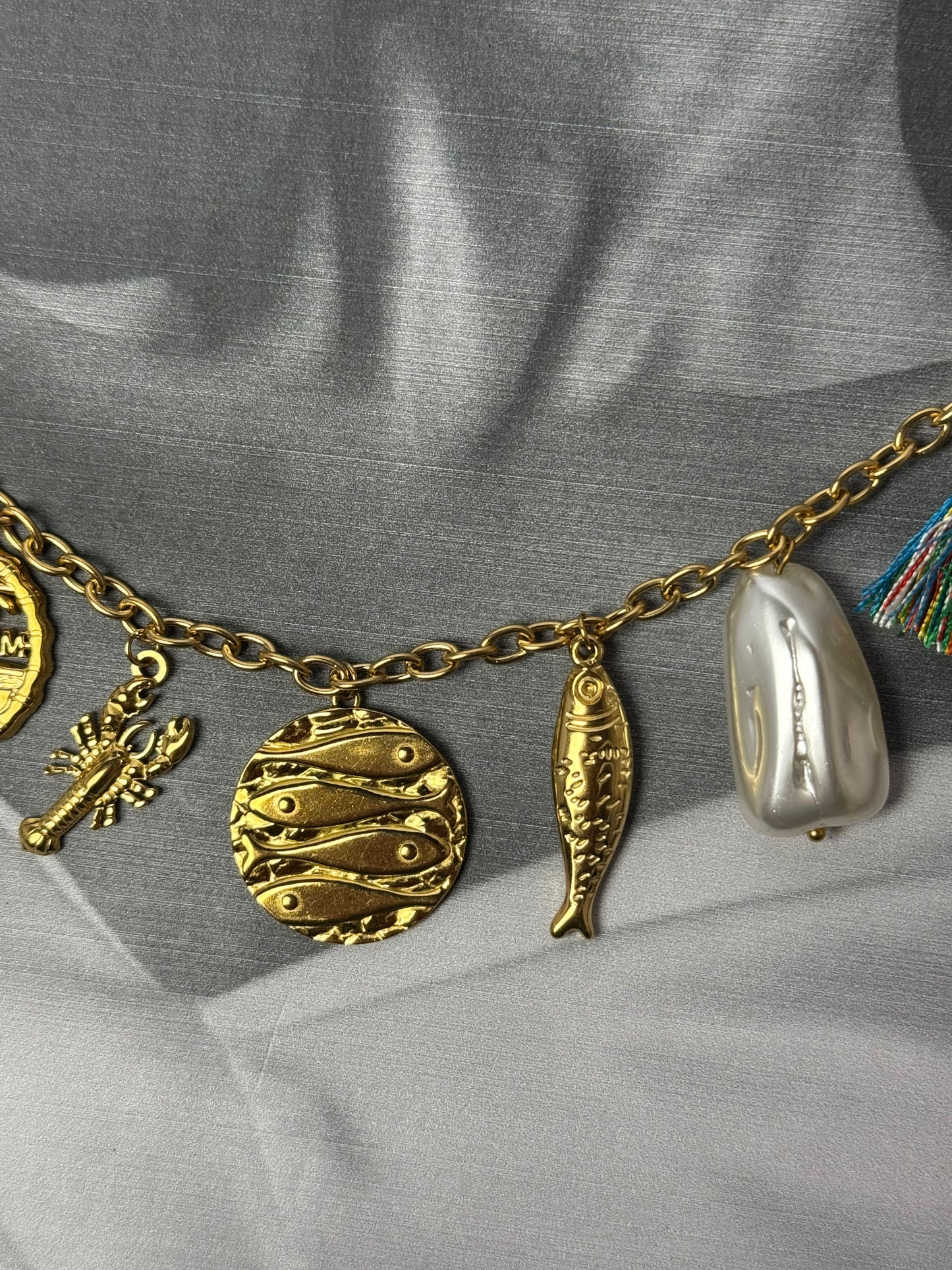 The waterproof ocean water charm necklace