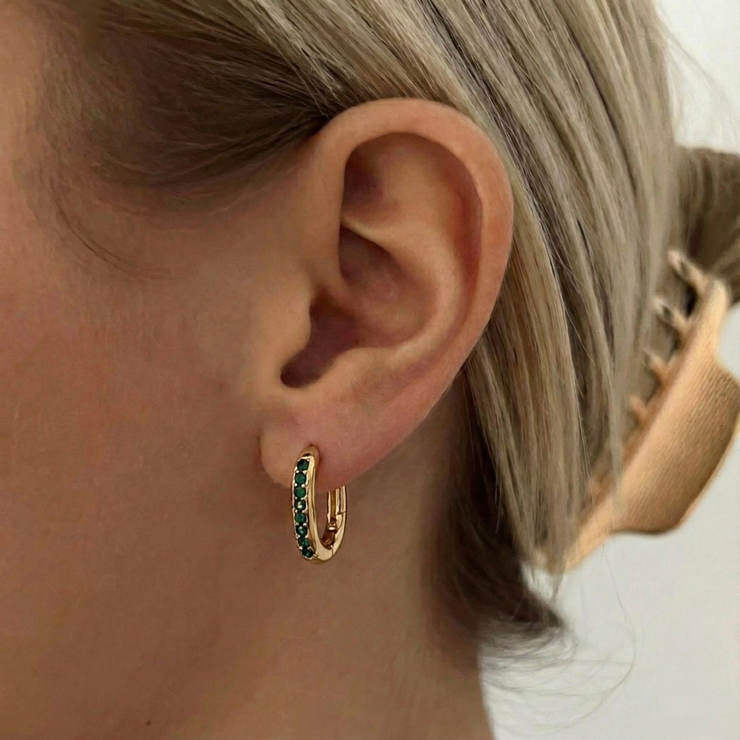 Minimalist Gold Oval Hoops with Green Emerald
