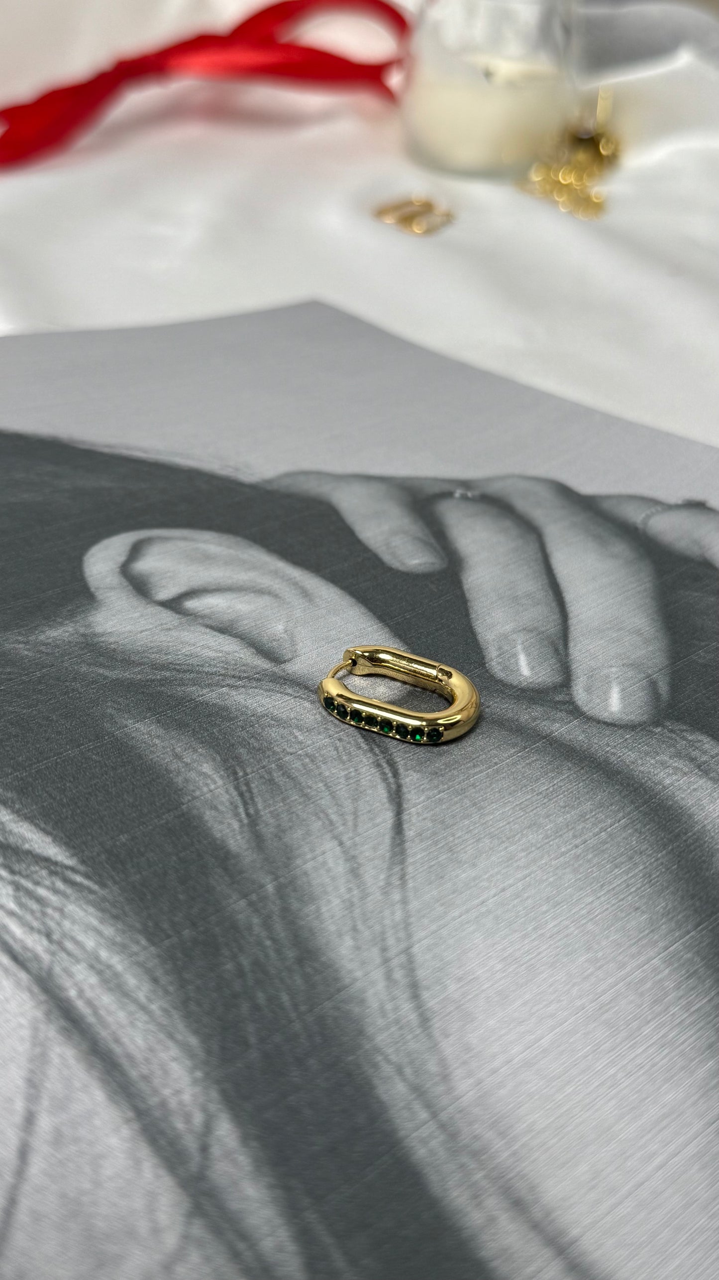 Minimalist Gold Oval Hoops with Green Emerald