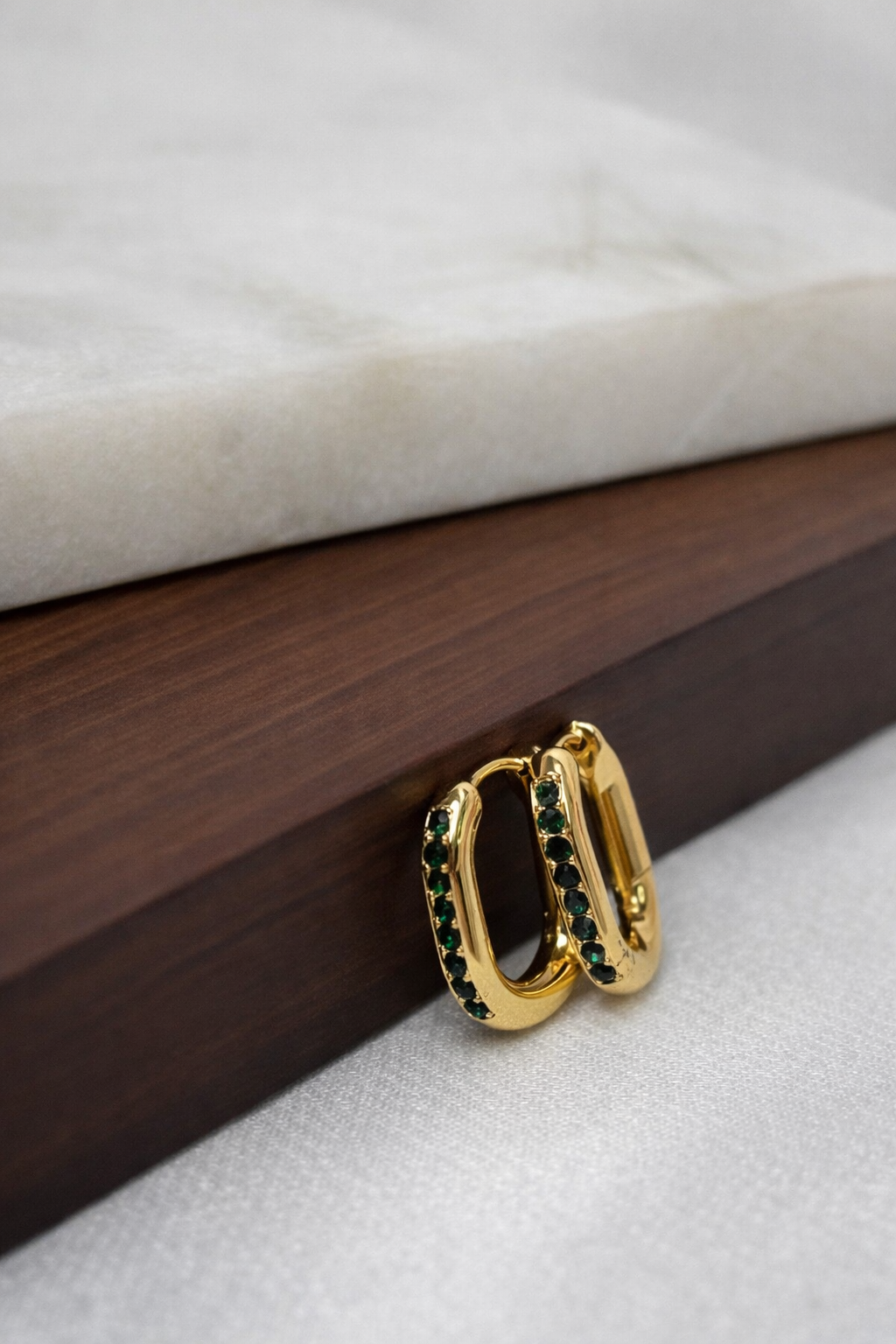 Minimalist Gold Oval Hoops with Green Emerald