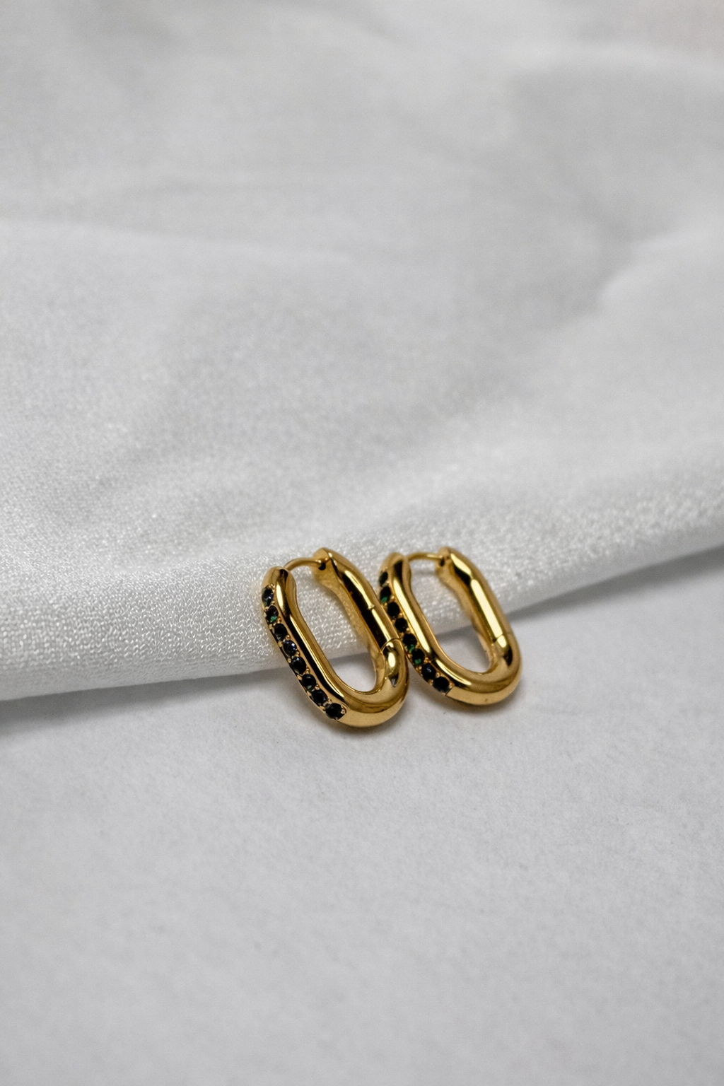 Minimalist Gold Oval Hoops with Green Emerald