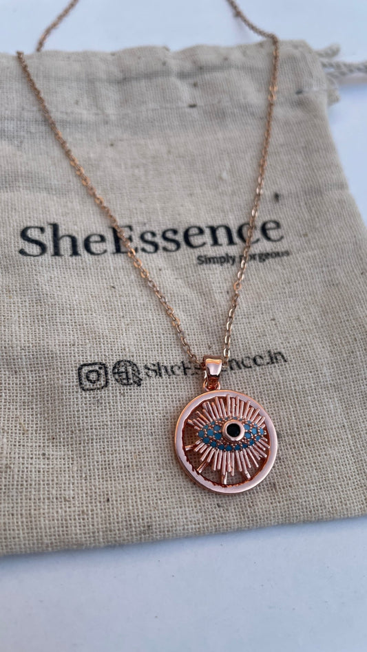 Rose gold evil eye pendant by SheEssence